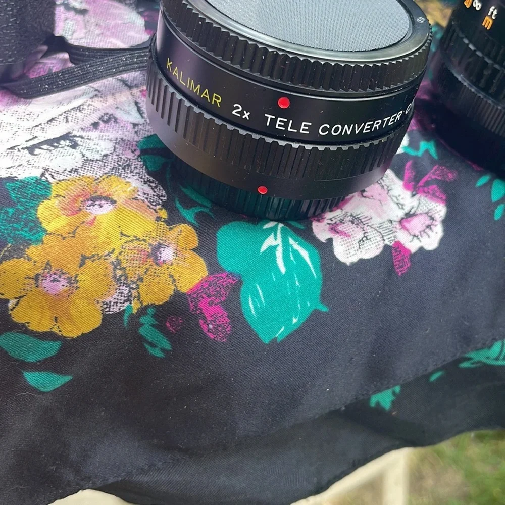 Canon ae 1 program camera with lenses and other accessories
